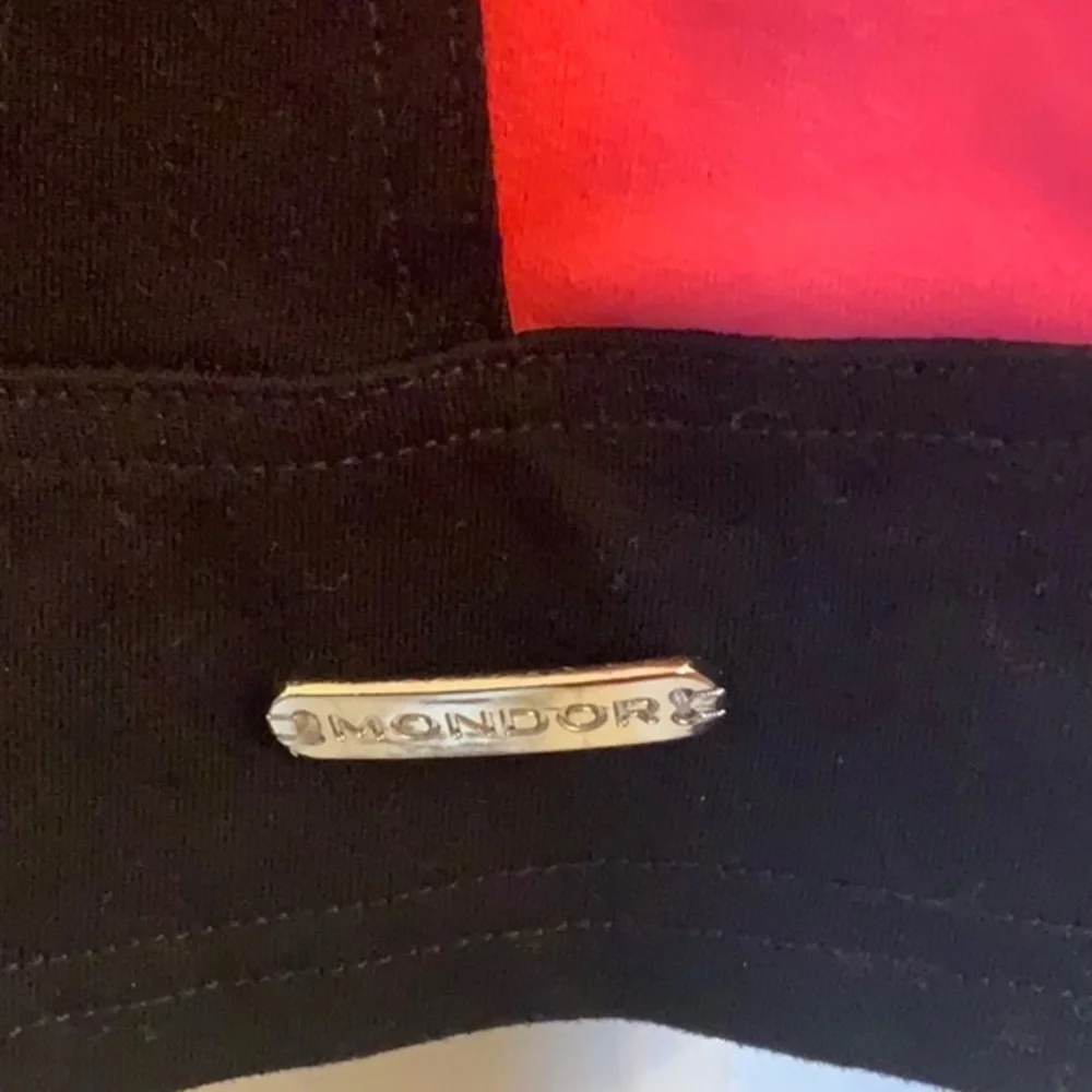 Mondor girls black and coral skating jacket in size 12 - 14